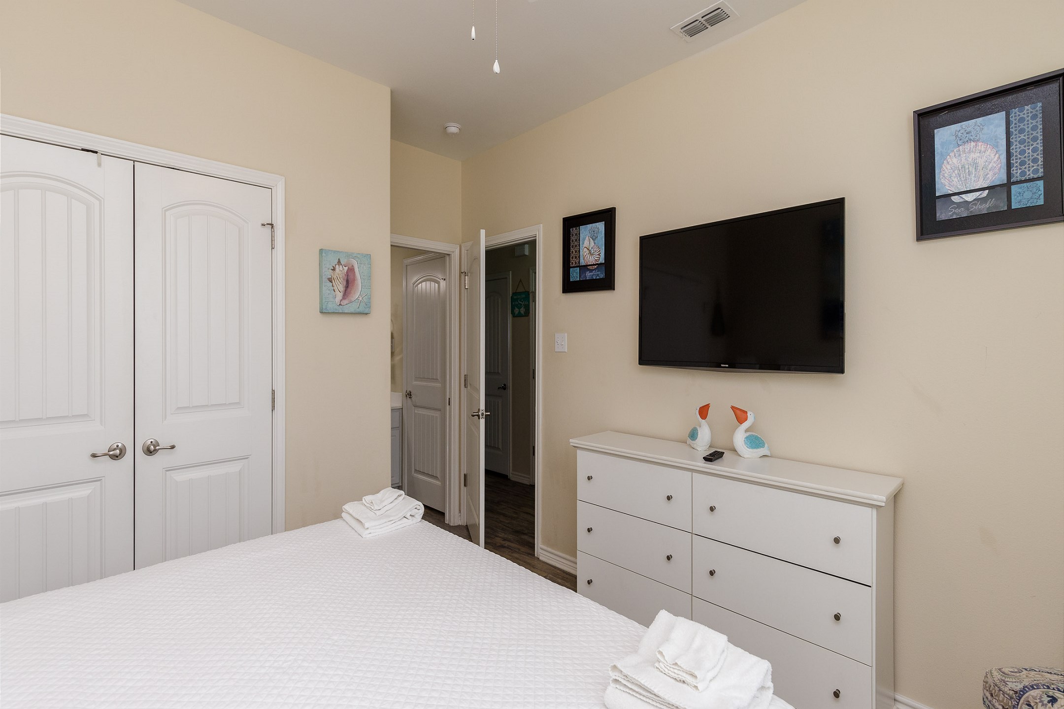 Master bedroom on the first floor with king size bed and flat screen TV