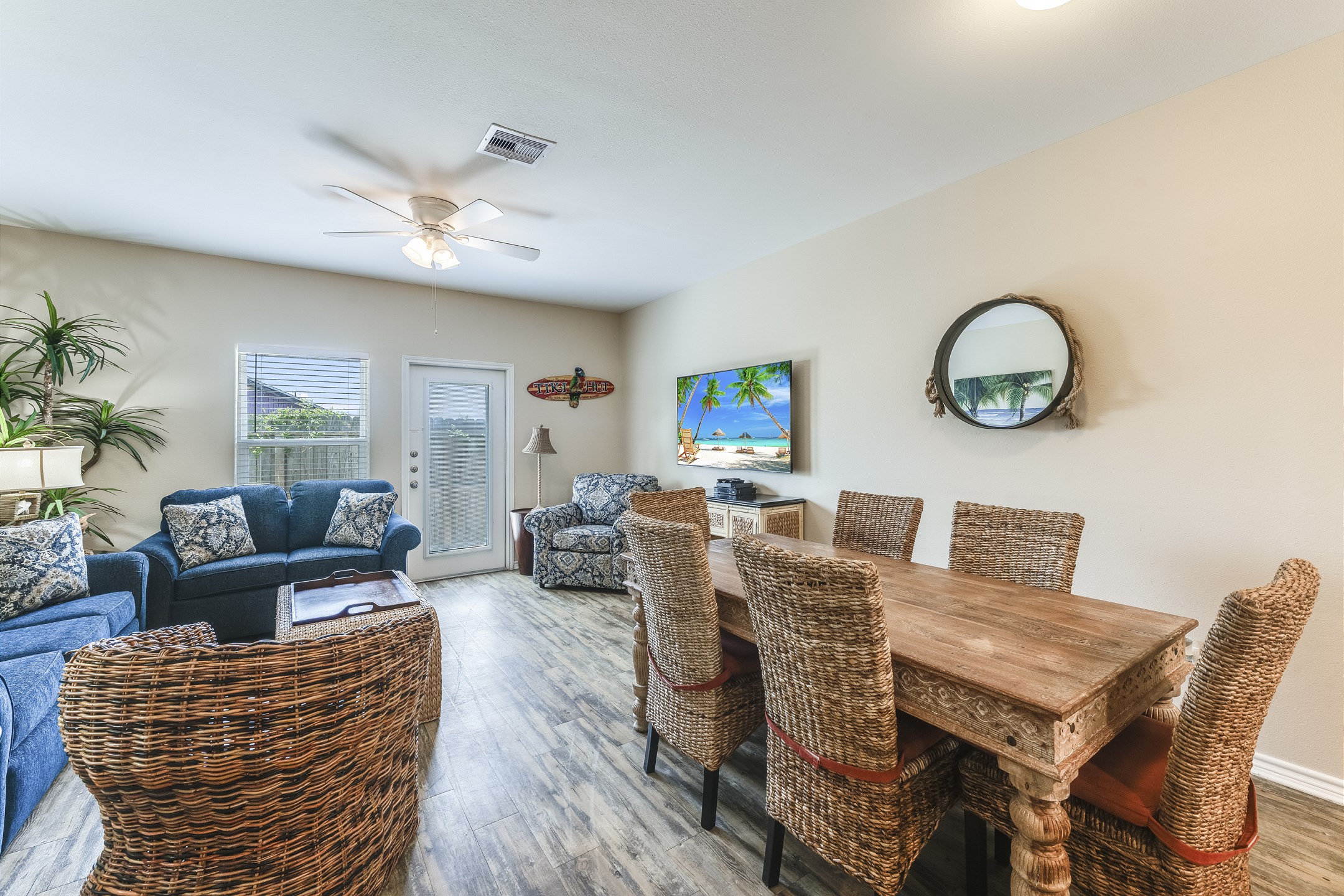 Open-concept layout connecting the dining area to the kitchen and living area