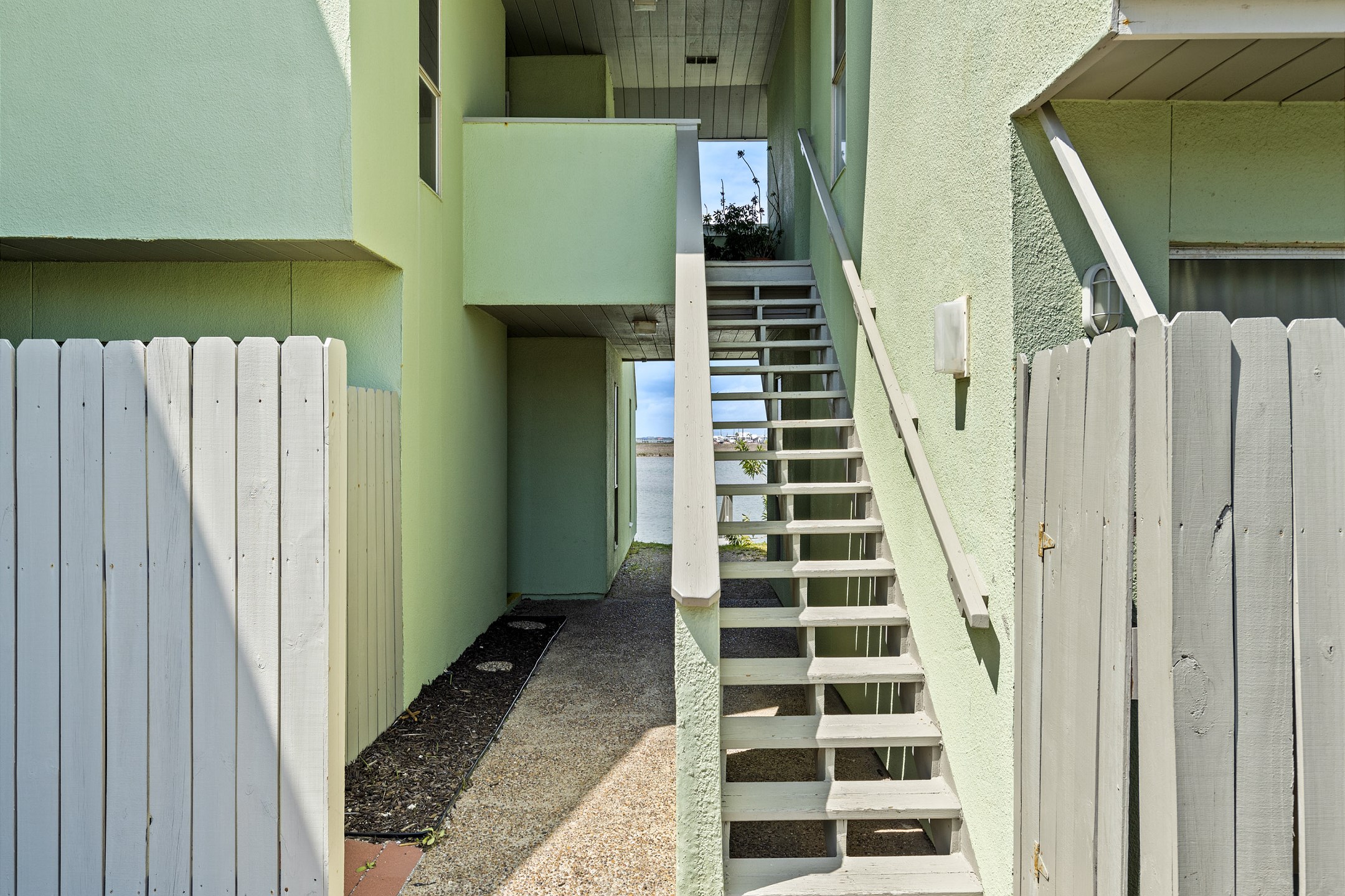 Main entrance on the second floor with coded lock for extra security