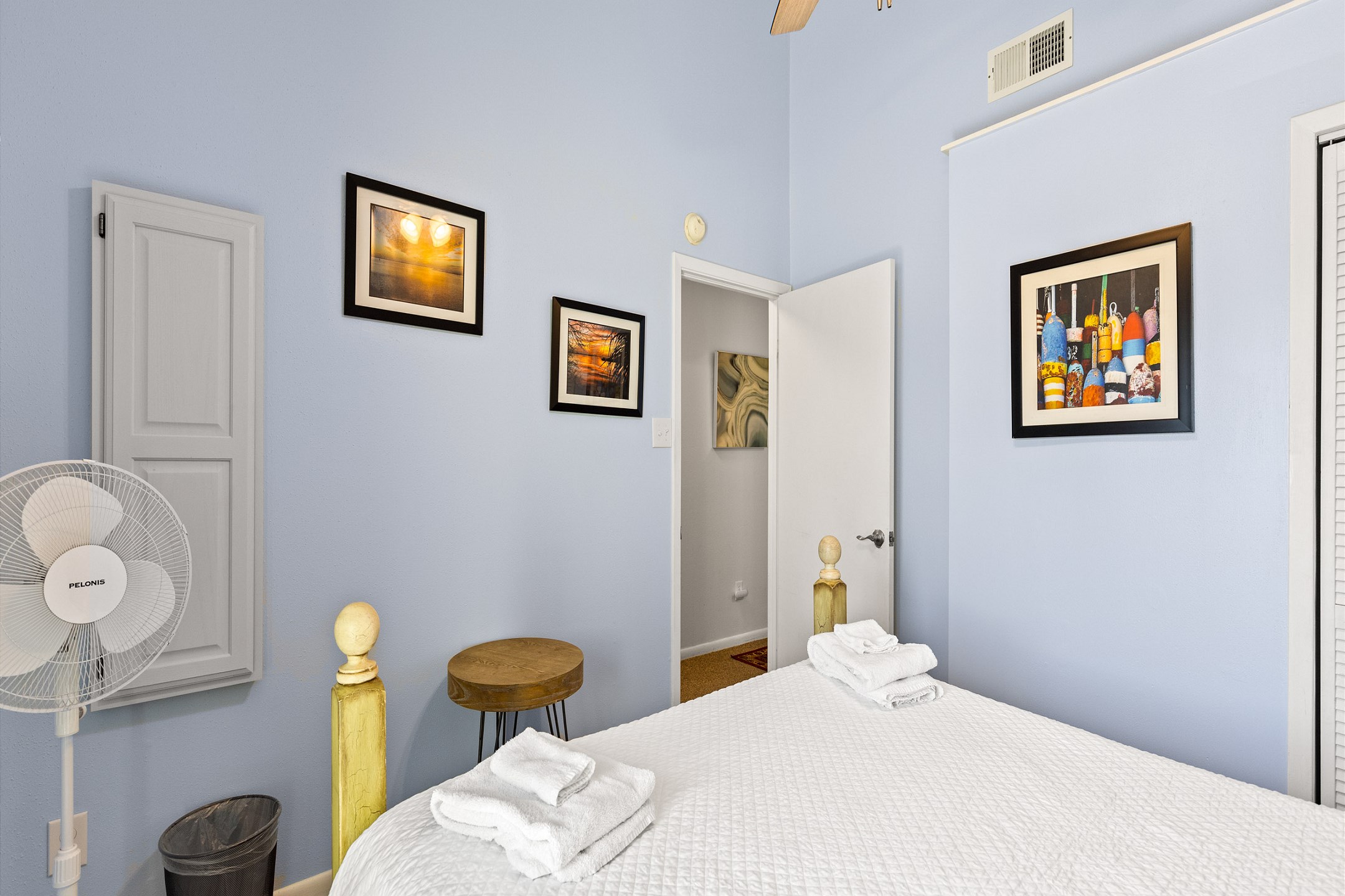 Second bedroom with queen size bed and balcony access 