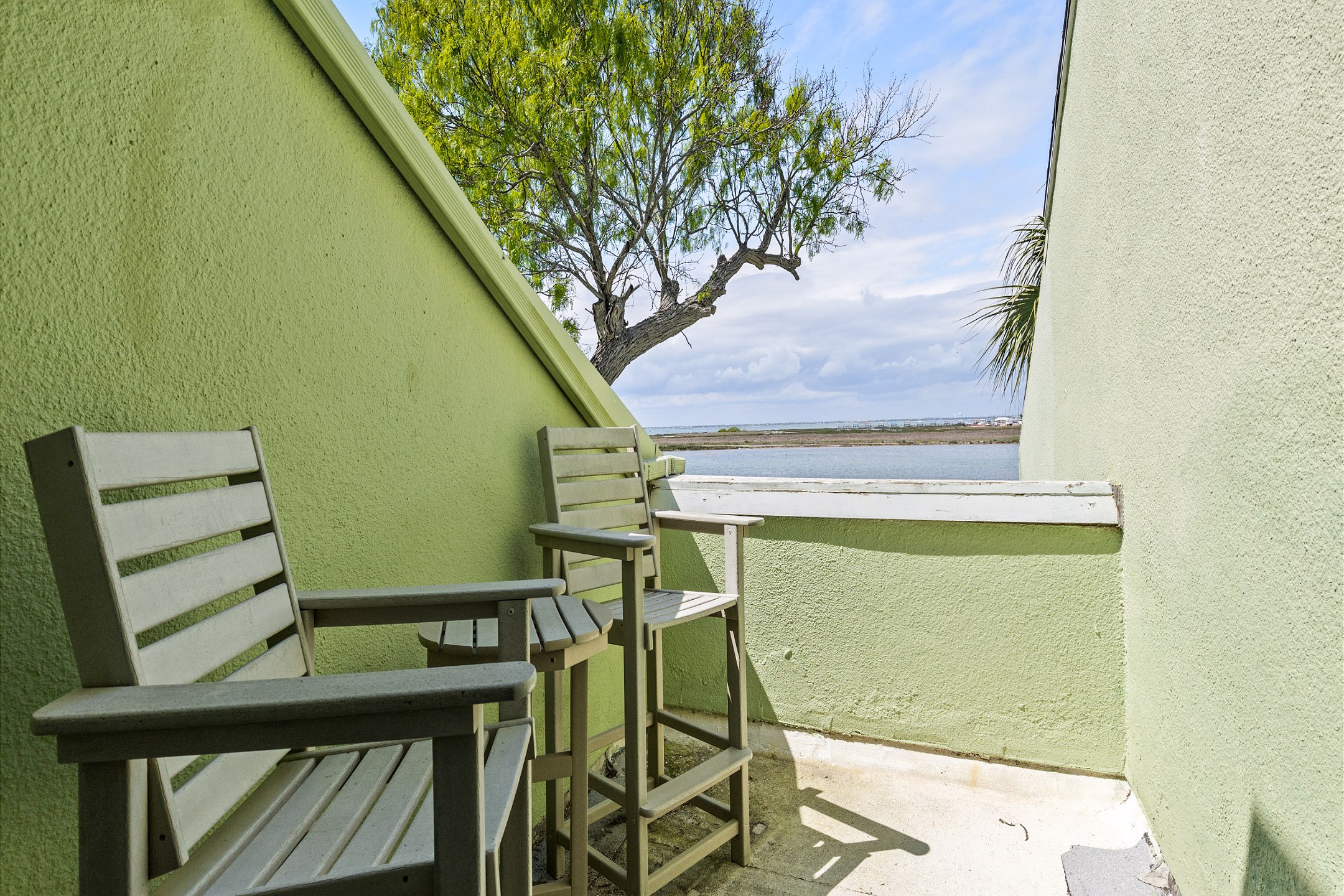 Private balcony off the master bedroom with canal views