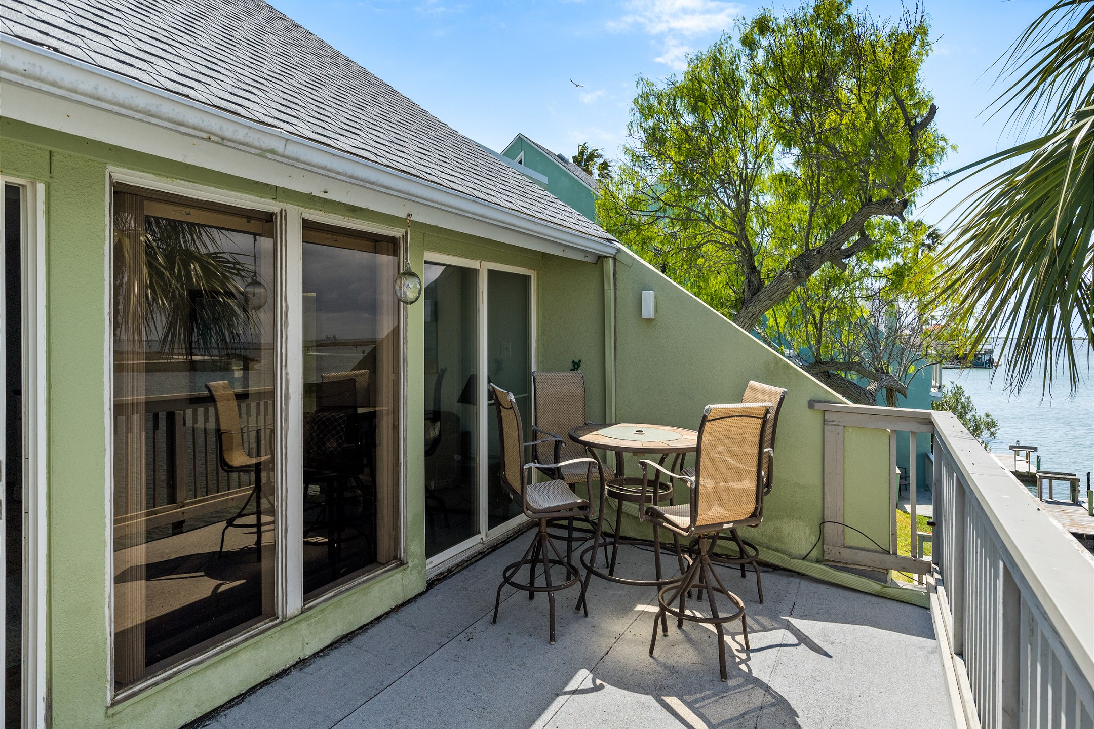 Step out from the living room to a beautiful balcony with access to outdoor dining space and stunning views