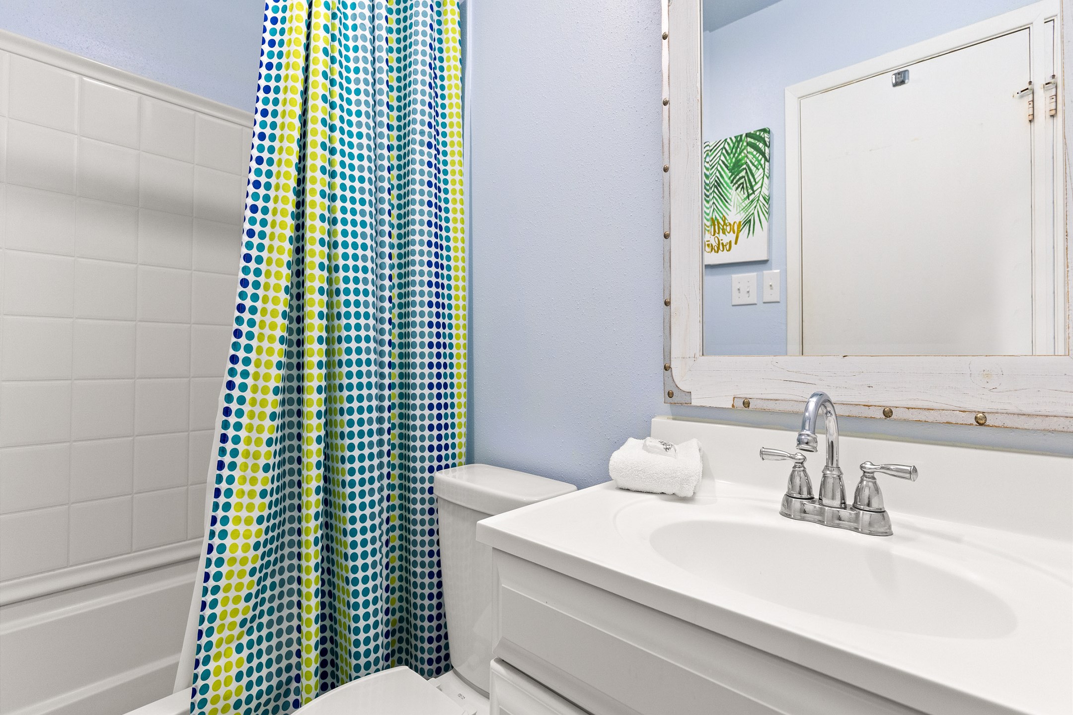 Guest bathroom with tub and shower combo