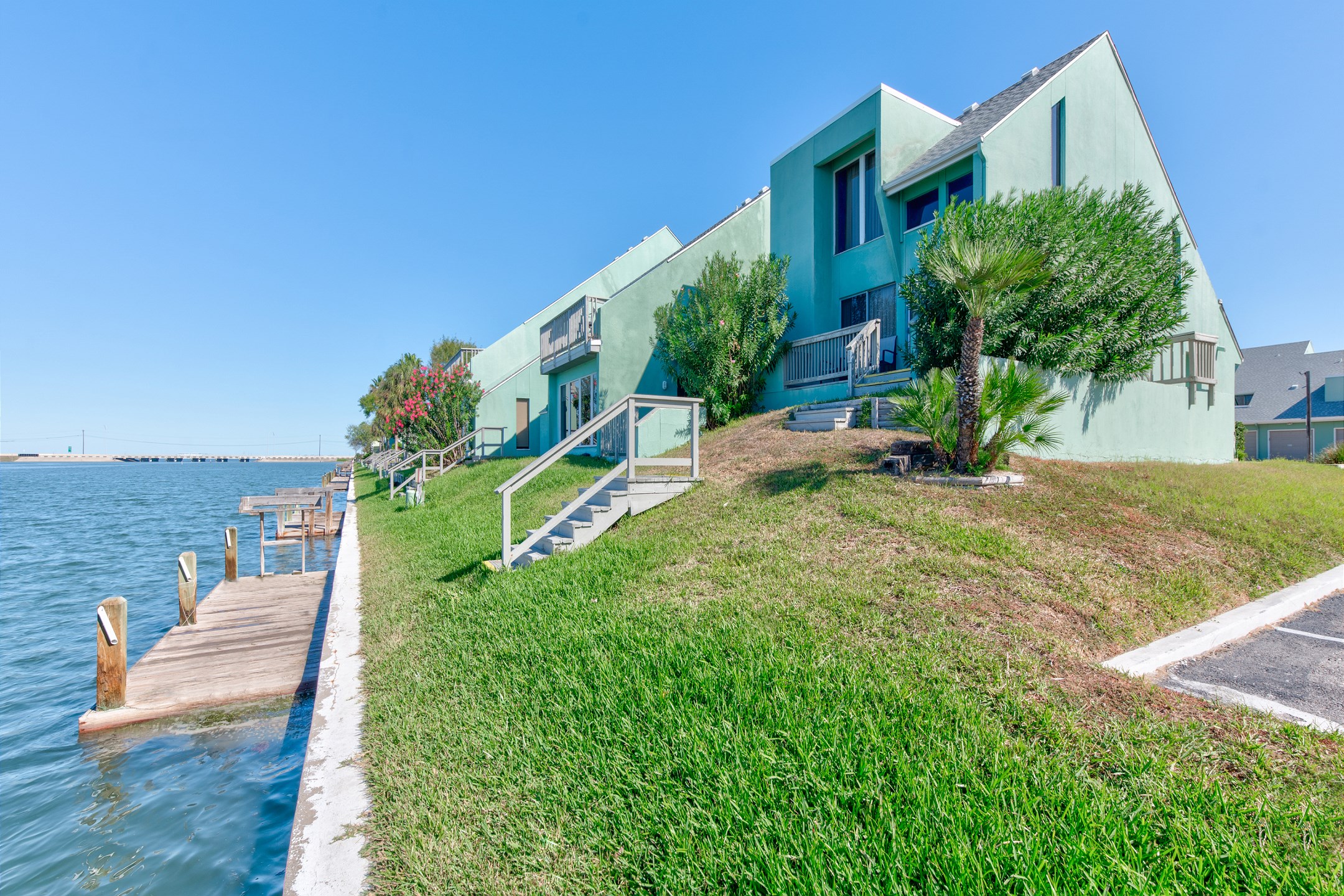 Waterfront complex with first come, first serve boat slips off the canal