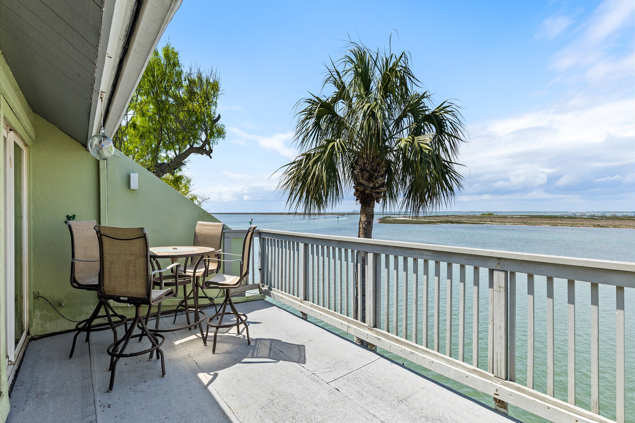 Panoramic view balcony of the canal with comfortable seating to enjoy the Texas breeze