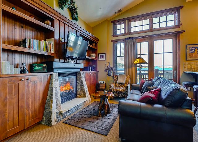 cozy fire in living room overlooking the ski area!