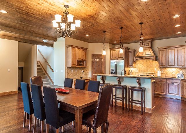 including the kitchen bar seats adjacent to dining table