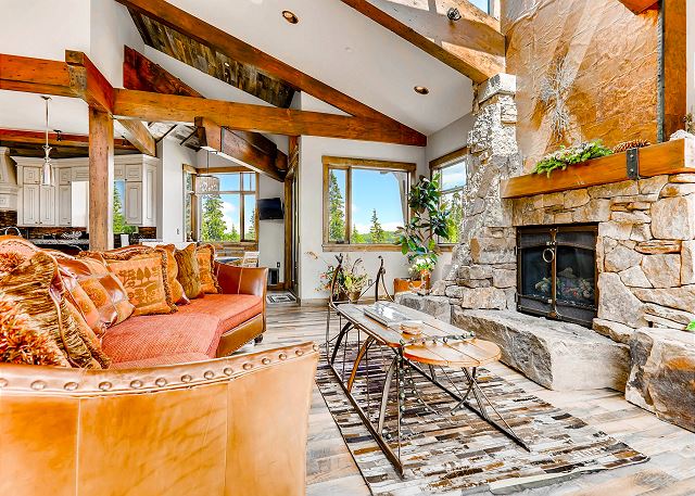 living area offers warmth by fireside and high beam mining details.