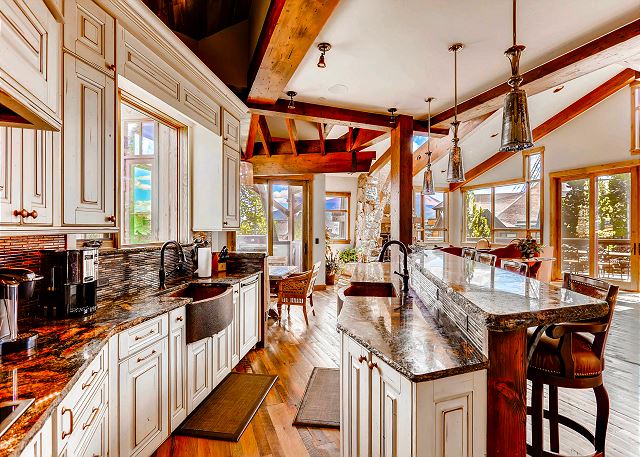 with bar seating, two sinks and all high end appliances