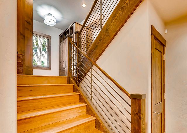take the stairs up to the main level or straight down to the lower den and billiards