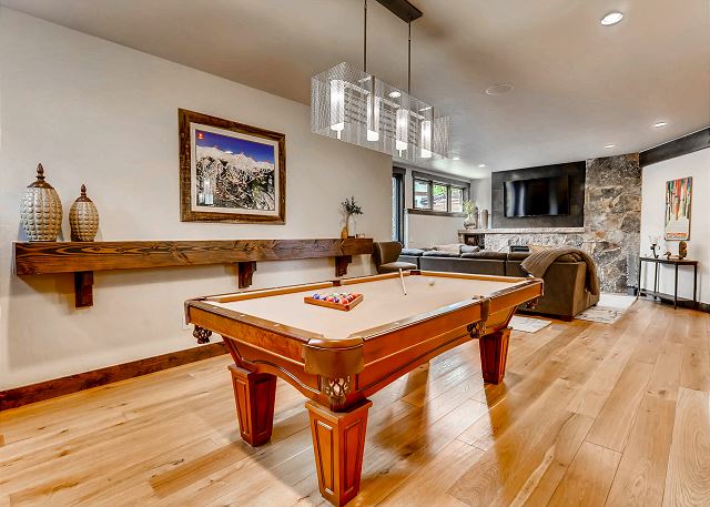 next to wet bar and lower den for perfect entertaining qualities