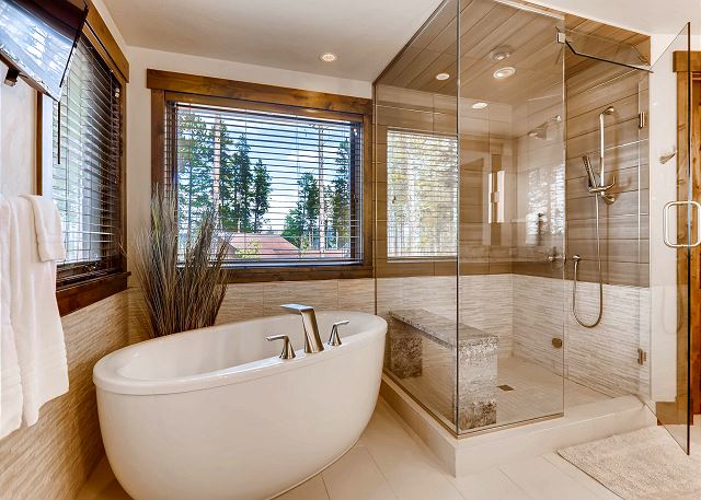 ensuite freestanding soaking tub and steam shower