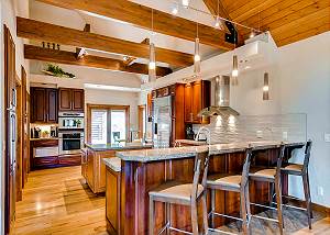 Spacious and open kitchen with bar seating for 4