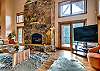 Large moss rock fireplace