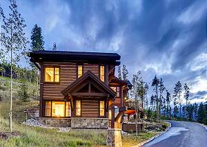 Exterior at dusk with a dramatic sky