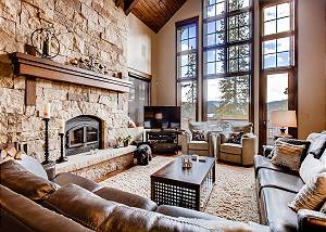Brightly lit great room with mountain views