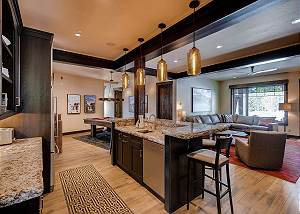 Mid level lounge area with wet bar
