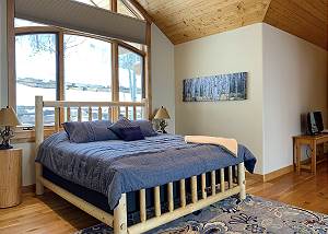 King bed in the Crest Family Suite