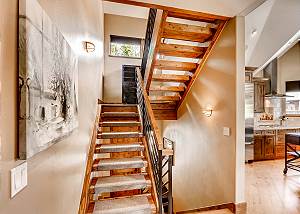 Stair case from main door to kitchen
