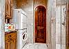 Laundry on Main Level and large steam room