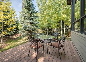 Deck with table and chairs