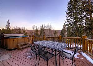 Deck with Hot Tub and outdoor seating