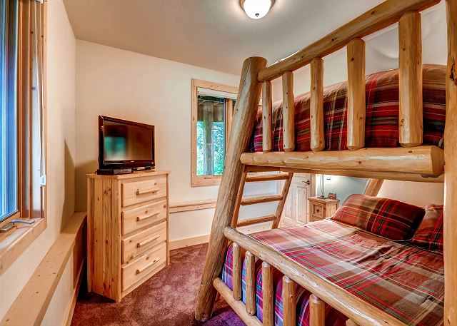 Spruce Room - sleeps 3-4 in a captain's bunk trundle (twin on top, twin trundle on pullout bottom, double (full) on lower bunk), exclusive hall bath