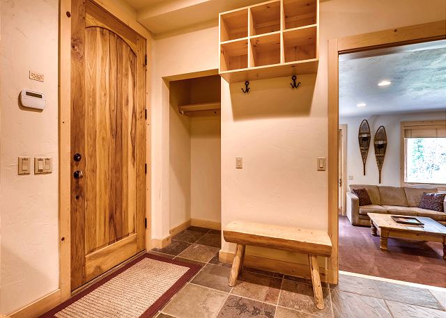 Entry from lower exterior and garage, includes cubby and hanging space for all your outdoor gear