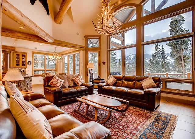 with large windows overlooking the majestic Breckenridge mountains