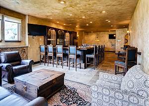 Lower level rec room with size full bar,