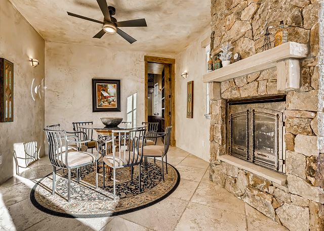 is adjacent to the Kitchen - the perfect place to sip on your morning coffee by the fire - or for the kids to dine in the evening!