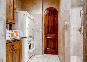 Laundry on Main Level and large steam room