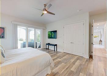 First Floor Primary Bedroom with HDTV