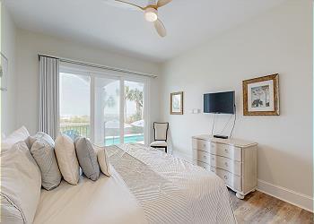 First Floor Guest Bedroom with Direct Access to Private Patio