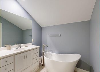 En-Suite Guest Bathroom with Freestanding Tub