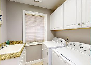 Laundry Room with Full Size Washer and Dryer