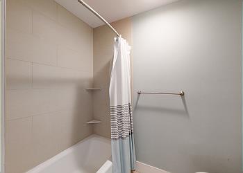 Guest Bathroom with Tub and Shower Combination