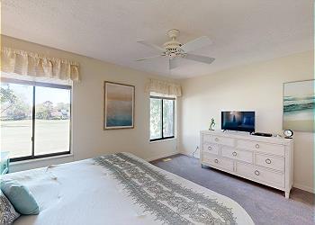 Primary Bedroom with View of the George Fazio Golf Course