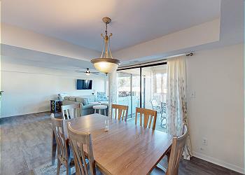 Dining and Living with Slider Access to Private Deck
