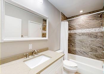 Jack and Jill Bathroom with Tub and Shower Combination