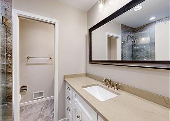 Primary Bathroom with His and Hers Vanity