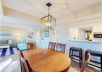 Dining Area Adjacent to Kitchen Bar Seating Two