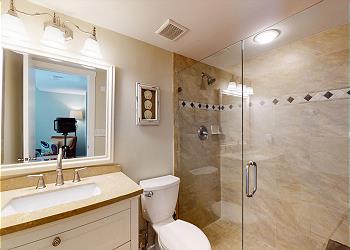 Updated Primary Bathroom with Tiled Walk-in Shower
