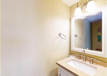 Half-Bath Off Living Room with Granite Vanity
