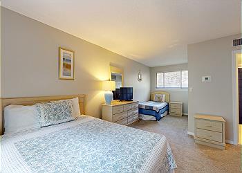 Guest Bedroom with Two Doubles and 1 Twin Sized Bed