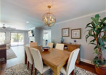 Formal Dining Adjacent to Living and Kitchen Areas