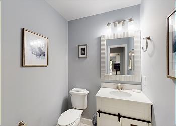 Half Bath off Kitchen and Laundry