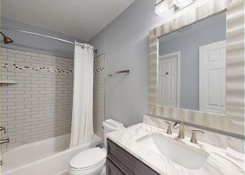 Jack and Jill Bathroom with Tub and Shower Combination