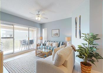Living Room with Slider to Private Balcony Area