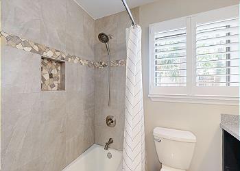 Guest Bathroom with Tiled Tub and Shower Combination